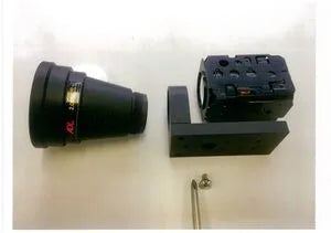 Camera lens and mounting bracket on a white background
